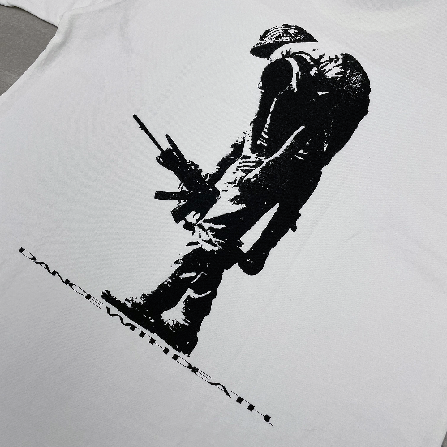 'NO MAN LEFT BEHIND' GRAPHIC LOGO TEE